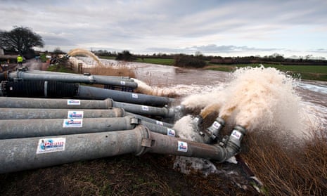 Floods defence : Floodwater pumped from the Somerset Levels into the River Parrett near Moorlands