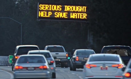 California drought : A sign warns motorists to save water