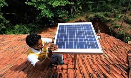 Cutting Co2 pollution : solar panel on the rooftop of a house in India