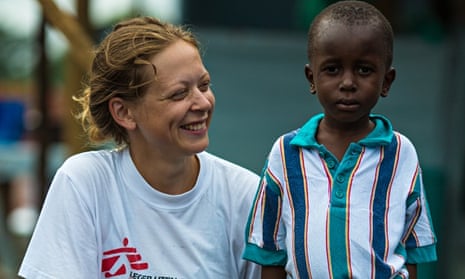 MDG : Ane Bjøru Fjeldsæter, an MSF Mental Health Manager from Norway, with Ebola survivor Patrick
