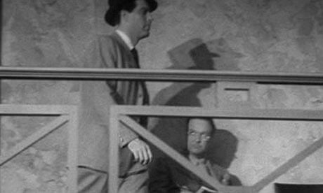 Raymond Chandler (sitting) in cameo in Double Indemnity