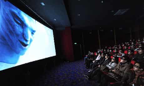 Chinese moviegoers watch Avatar in a cinema in Hefei, in Anhui province