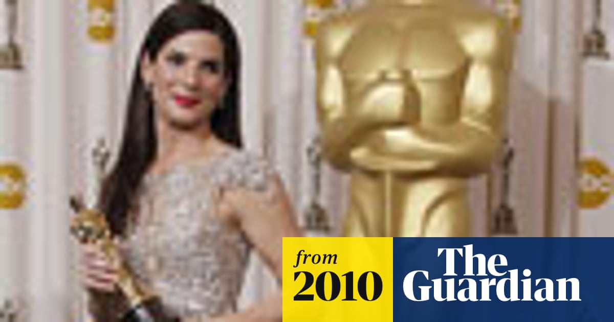 sandra bullock gold dress Sandra Bullock Lights Up the 2020 Golden Globes in Marigold Gown
