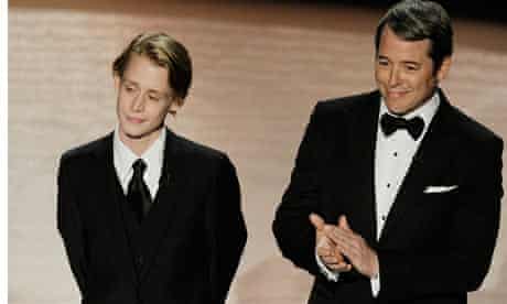 Macauley Culkin and Matthew Broderick present a tribute to John Hughes at the Oscars 2010