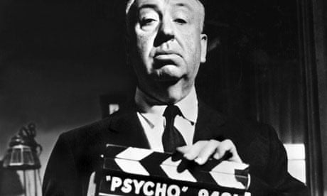 Alfred Hitchcock with the Psycho clapperboard