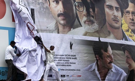 Protesters tear down a poster for Aarakshan in Mumbai. 