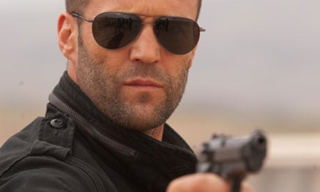 Jason Statham in Killer Elite - aviators plus gun