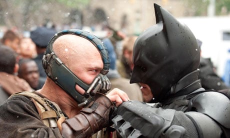 Tom Hardy as Bane and Christian Bale as Batman in The Dark Knight Rises.