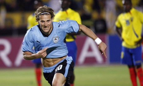 Uruguay's Diego Forlan celebrates after scoring the winner against Ecuador