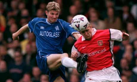 Chelsea's Tore Andre Flo battles with Arsenal's Emmanuel Petit