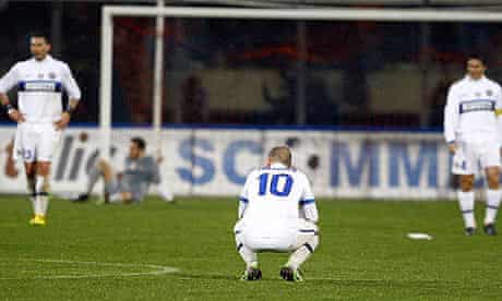 Inter players stand dejected