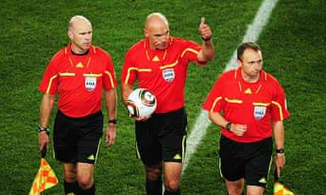 Howard Webb, centre, Michael Mullarkey, left, and Darren Cann have done well at the World Cup