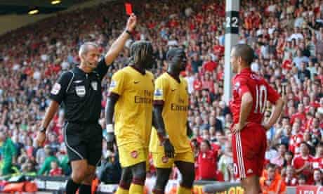 Martin Atkinson shows Liverpool's Joe Cole a red card