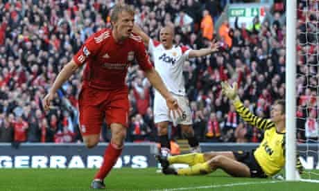 Liverpool's Dirk Kuyt celebrates scoring his third goal against Manchester United at Anfield