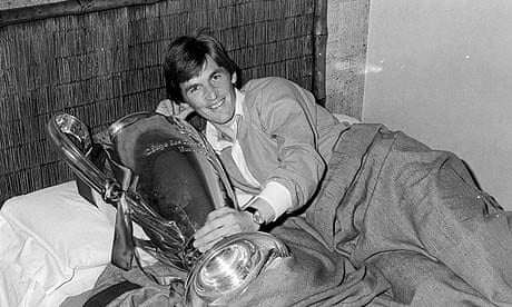 Kenny Dalglish takes the European Cup to bed with him in his hotel room after Liverpool's triumph