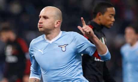 Lazio's Tommaso Rocchi celebrates after scoring the second goal against AC Milan