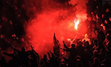 https://i.guim.co.uk/img/static/sys-images/Football/Clubs/Club_Home/2013/12/3/1386075785892/Flares-are-lit-at-the-Man-011.jpg?crop=none&dpr=1&s=none&width=465