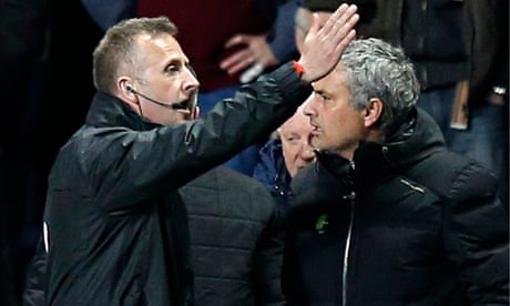 Chelsea's José Mourinho is shown out of the dugout by fourth official Jonathan Moss at Aston Villa