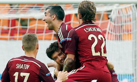 Russia's players celebrate during their 2-0 World Cup warm-up victory over Morocco in Moscow