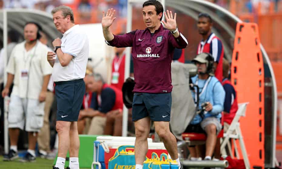 Gary Neville giving orders from the touchline of England's friendly against Honduras.