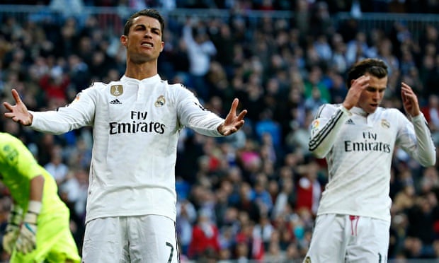 Real Madrid's Cristiano Ronaldo, left, shows his frustration after Gareth Bale did not pass to him