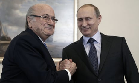 The Russian president, Vladimir Putin, right, and Fifa's Sepp Blatter met in St Petersburg