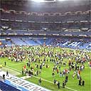 Fans are escorted out of the Bernabeu