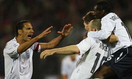 England players celebrate Wayne Rooney's second goal against Belarus