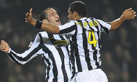 Juventus defender Giorgio Chiellini celebrates with Felipe Melo after scoring