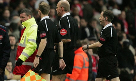 Half-time, referees leave field