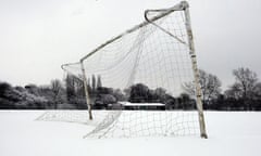 A snow covered football pitch