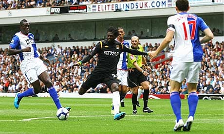 Emmanuel Adebayor scores a debut goal to put Manchester City 1-0 up against Blackburn Rovers.