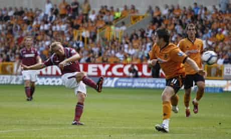 Mark Noble curls home the opening goal in West Ham's win at Wolves.