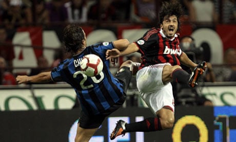 Inter Milan's Chivu fights for the ball with AC Milan's Gattuso 