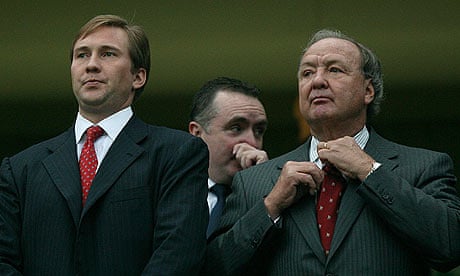 Liverpool's co-owner Tom Hicks (right) and son Tom Hicks Jr (left)