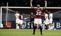 Egypt's Wael Gomaa raises his arms in celebration after his team took a 1-0 lead