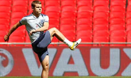 Jack Wilshere warms up for an England team training session at Wembley stadium in June 