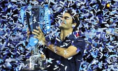 Roger Federer poses with the ATP World Tour Finals trophy