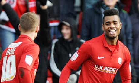 Barnsley's Ricardo Vaz Te celebrates the first of his goals against Leeds United with Matt Done