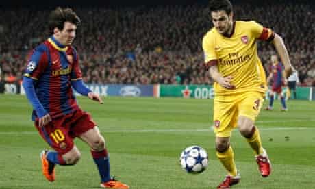 Arsenal's Cesc Fábregas, right, and Lionel Messi of Barcelona
