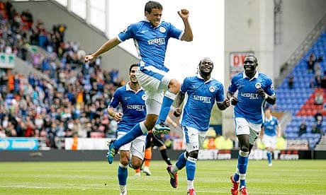 Franco Di Santo celebrates after scoring Wigan Athletic's first goal against QPR at the DW Stadium