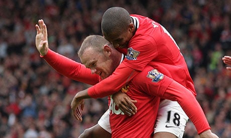 Wayne Rooney and Ashley Young celebrate