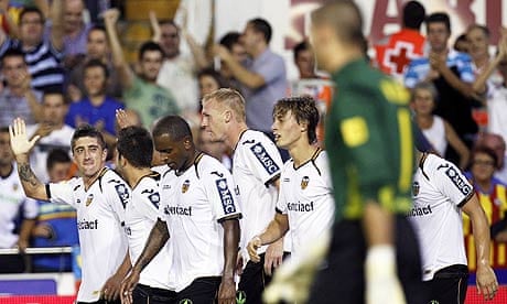 Valencia's players celebrate during the scintillating 2-2 draw against Barcelona