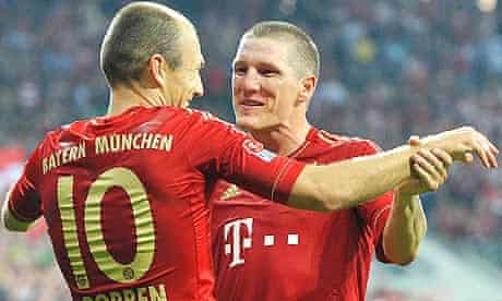 Arjen Robben and Bastian Schweinsteiger celebrate