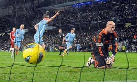 Manchester City's James Milner celebrates scoring his side's penalty past Liverpool's Pepe Reina