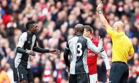 Tottenham Hotspur's Emmanuel Adebayor sent off by Howard Webb for a foul on Arsenal's Santi Cazorla