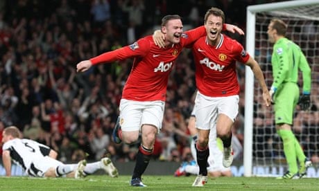 Wayne Rooney celebrates with Jonny Evans after scoring for Manchester United against Fulham.