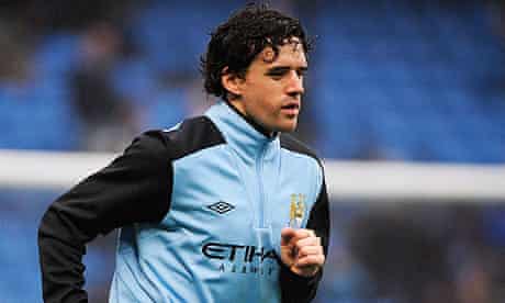 Owen Hargreaves warms up before Manchester City's FA Cup tie with United, his last game for the club