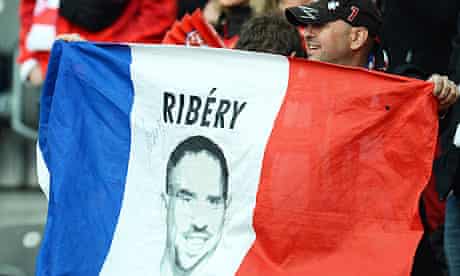 A Bayern Munich fan shows his support for the France midfielder Franck Ribéry, a threat to Chelsea