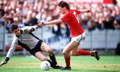 England's Chris Waddle takes on Aylesbury goalkeeper Tim Garner during their 1988 friendly